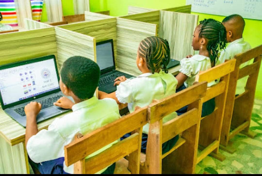 Pupils using computers in the ICT room at Ambassadors Bilingual School, Lagos