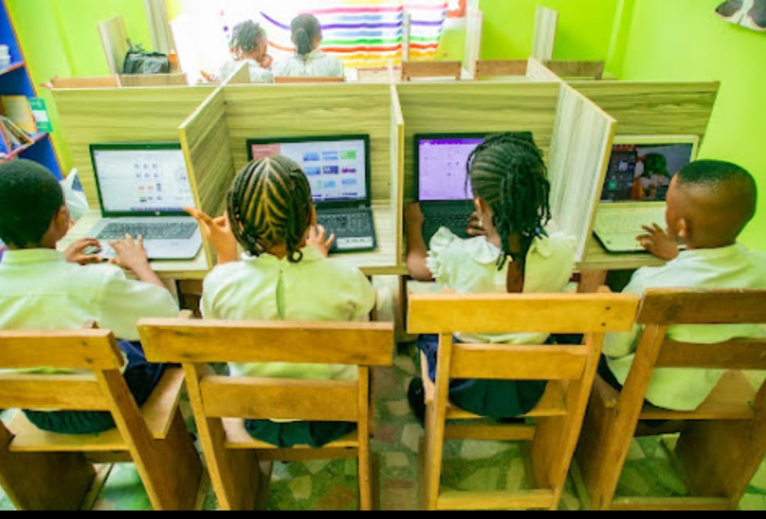 Pupils using computers in the ICT room at Ambassadors Bilingual School, Lagos